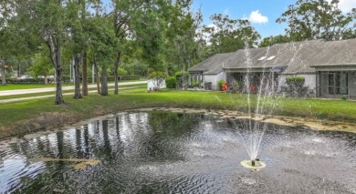 -THIS HOME IS A ABSOLUTE MUST SEE- Experience serene pond views on Lansbrook Golf Club in Florida - for sale on GolfHomes.com, golf home, golf lot