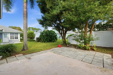 Beautifully updated home in a quiet New Smyrna Beach on Hidden Lakes Golf Club in Florida - for sale on GolfHomes.com, golf home, golf lot