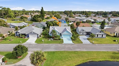 Beautifully updated home in a quiet New Smyrna Beach on Hidden Lakes Golf Club in Florida - for sale on GolfHomes.com, golf home, golf lot