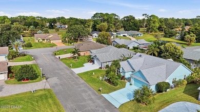 Beautifully updated home in a quiet New Smyrna Beach on Hidden Lakes Golf Club in Florida - for sale on GolfHomes.com, golf home, golf lot
