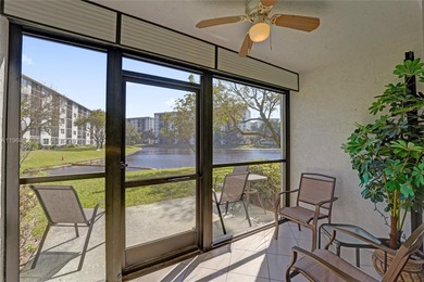 *** BEAUTIFUL VIEW ON THE LAKE FROM THE 1ST FLOOR UNIT FROM THE on Palm-Aire Country Club and Resort - Palms in Florida - for sale on GolfHomes.com, golf home, golf lot