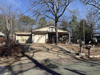 Welcome to your Fairfield Bay retreat! This 3-bedroom, 2-bath on Indian Hills Country Club in Arkansas - for sale on GolfHomes.com, golf home, golf lot
