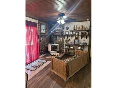 Welcome to your Fairfield Bay retreat! This 3-bedroom, 2-bath on Indian Hills Country Club in Arkansas - for sale on GolfHomes.com, golf home, golf lot