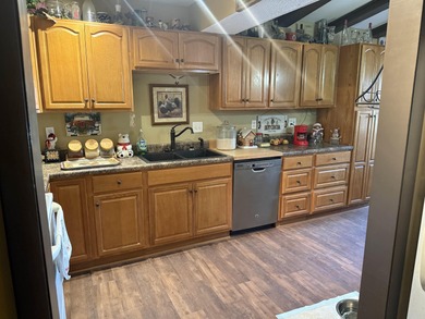 Welcome to your Fairfield Bay retreat! This 3-bedroom, 2-bath on Indian Hills Country Club in Arkansas - for sale on GolfHomes.com, golf home, golf lot