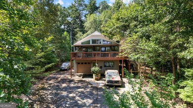 Welcome to 329 Chickadee Ct, a retreat where comfort meets the on Turtle Cove Golf Course in Georgia - for sale on GolfHomes.com, golf home, golf lot