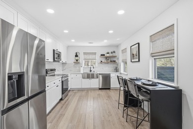 Welcome to this stunning lakefront home in the gated community on The Golf Club at Cuscowilla in Georgia - for sale on GolfHomes.com, golf home, golf lot