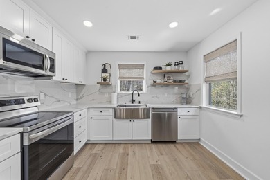 Welcome to this stunning lakefront home in the gated community on The Golf Club at Cuscowilla in Georgia - for sale on GolfHomes.com, golf home, golf lot