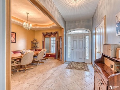 Lovely ranch style home with a spectacular view overlooking the on Carrington Golf Club in Michigan - for sale on GolfHomes.com, golf home, golf lot