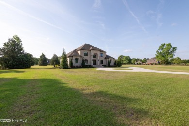 Luxury, craftsmanship, and privacy converge at 541 White Horse on Ironwood Golf and Country Club in North Carolina - for sale on GolfHomes.com, golf home, golf lot