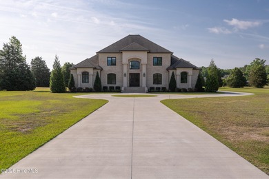Luxury, craftsmanship, and privacy converge at 541 White Horse on Ironwood Golf and Country Club in North Carolina - for sale on GolfHomes.com, golf home, golf lot
