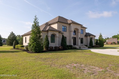 Luxury, craftsmanship, and privacy converge at 541 White Horse on Ironwood Golf and Country Club in North Carolina - for sale on GolfHomes.com, golf home, golf lot