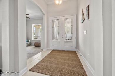 Step into effortless elegance in this beautifully appointed on Amelia National Golf and Country Club in Florida - for sale on GolfHomes.com, golf home, golf lot