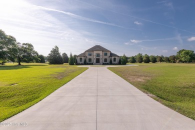 Luxury, craftsmanship, and privacy converge at 541 White Horse on Ironwood Golf and Country Club in North Carolina - for sale on GolfHomes.com, golf home, golf lot