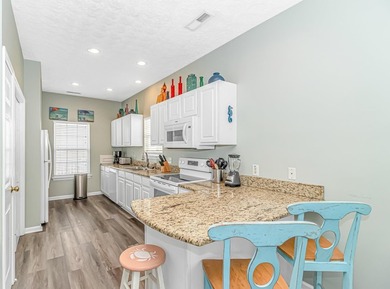 This spacious 4 LARGE Bedroom 4 Bath raised beach house is just on Prestwick Country Club in South Carolina - for sale on GolfHomes.com, golf home, golf lot