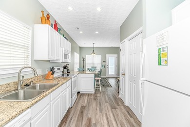 This spacious 4 LARGE Bedroom 4 Bath raised beach house is just on Prestwick Country Club in South Carolina - for sale on GolfHomes.com, golf home, golf lot