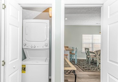 This spacious 4 LARGE Bedroom 4 Bath raised beach house is just on Prestwick Country Club in South Carolina - for sale on GolfHomes.com, golf home, golf lot