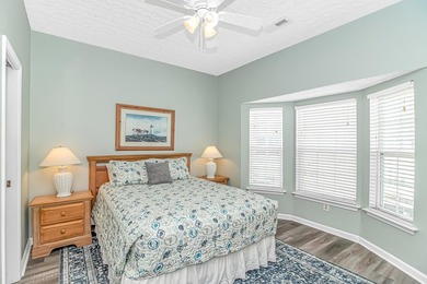 This spacious 4 LARGE Bedroom 4 Bath raised beach house is just on Prestwick Country Club in South Carolina - for sale on GolfHomes.com, golf home, golf lot