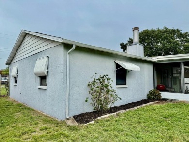 Come see this 3-bedroom 2-bathroom 2 car garage block home on Babe Zaharias Golf Course in Florida - for sale on GolfHomes.com, golf home, golf lot