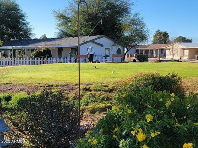 This is a very nice level lot with all utilities to the property on 3 Parks Fairways in Arizona - for sale on GolfHomes.com, golf home, golf lot