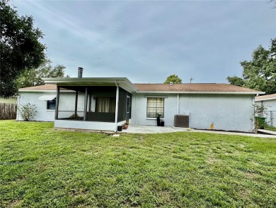 Come see this 3-bedroom 2-bathroom 2 car garage block home on Babe Zaharias Golf Course in Florida - for sale on GolfHomes.com, golf home, golf lot