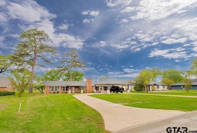Welcome to your idyllic retreat nestled along the beautiful golf on Hide-A-Way Lake Golf Course in Texas - for sale on GolfHomes.com, golf home, golf lot