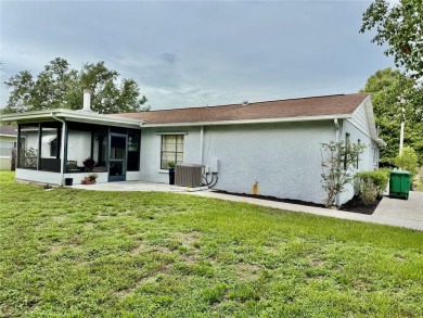 Come see this 3-bedroom 2-bathroom 2 car garage block home on Babe Zaharias Golf Course in Florida - for sale on GolfHomes.com, golf home, golf lot