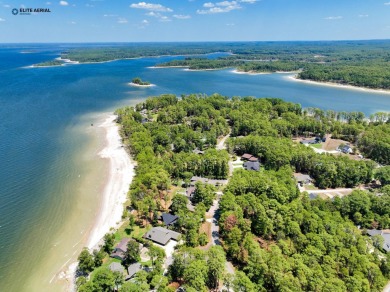 Nestled in the highly sought-after waterfront section of Rayburn on Rayburn Country Club in Texas - for sale on GolfHomes.com, golf home, golf lot