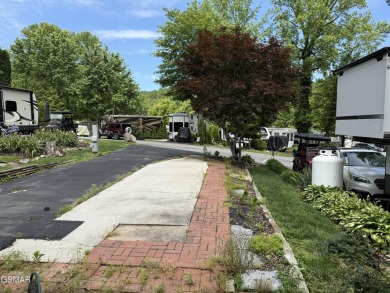 Beautifully landscaped VACANT lot with a great view located in a on Bent Creek Golf Course in Tennessee - for sale on GolfHomes.com, golf home, golf lot