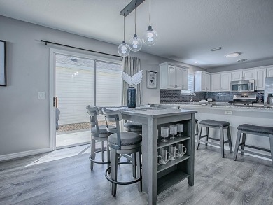 Bond Paid and exceptional Living awaits in this stylish on Mallory Hill Golf and Country Club in Florida - for sale on GolfHomes.com, golf home, golf lot