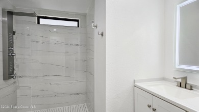 BUYERS HOME SALE FELL THROUGH!!!!!! Beautifully remodeled 2 on Barefoot Bay Golf Course in Florida - for sale on GolfHomes.com, golf home, golf lot