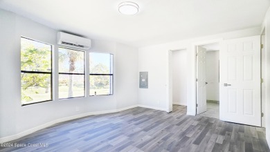 BUYERS HOME SALE FELL THROUGH!!!!!! Beautifully remodeled 2 on Barefoot Bay Golf Course in Florida - for sale on GolfHomes.com, golf home, golf lot