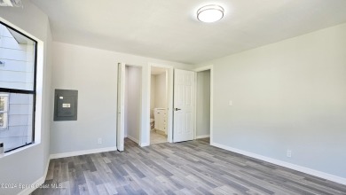 BUYERS HOME SALE FELL THROUGH!!!!!! Beautifully remodeled 2 on Barefoot Bay Golf Course in Florida - for sale on GolfHomes.com, golf home, golf lot