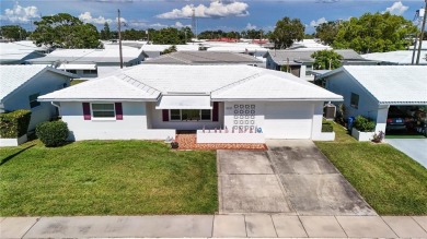 BETTER BE QUICK TO THIS ABSOLUTELY TURN KEY HOME IN THE ACTIVE on Mainlands Golf Club in Florida - for sale on GolfHomes.com, golf home, golf lot