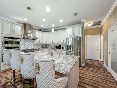 Step into a world of refined elegance and sophistication at this on Walden Lake Golf and Country Club  in Florida - for sale on GolfHomes.com, golf home, golf lot