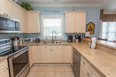 This beautiful lake view end 3-bedroom 2-bathroom FULLY on  in South Carolina - for sale on GolfHomes.com, golf home, golf lot