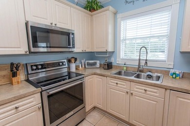 This beautiful lake view end 3-bedroom 2-bathroom FULLY on  in South Carolina - for sale on GolfHomes.com, golf home, golf lot