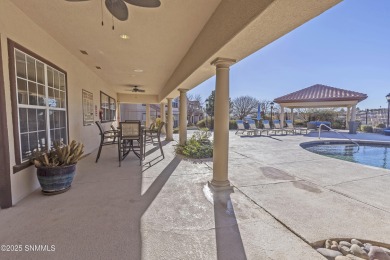 Nestled in a gated condominium community near a golf course and on Sonoma Ranch Golf Course in New Mexico - for sale on GolfHomes.com, golf home, golf lot