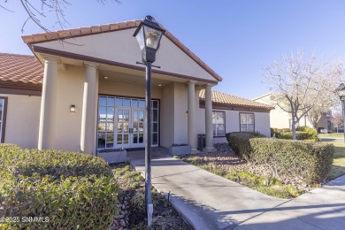 Nestled in a gated condominium community near a golf course and on Sonoma Ranch Golf Course in New Mexico - for sale on GolfHomes.com, golf home, golf lot