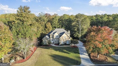 Experience luxury living at its finest in this custom-built home on Eagles Landing Country Club in Georgia - for sale on GolfHomes.com, golf home, golf lot