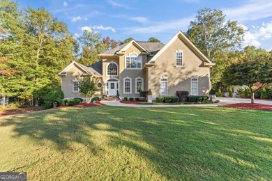 Experience luxury living at its finest in this custom-built home on Eagles Landing Country Club in Georgia - for sale on GolfHomes.com, golf home, golf lot