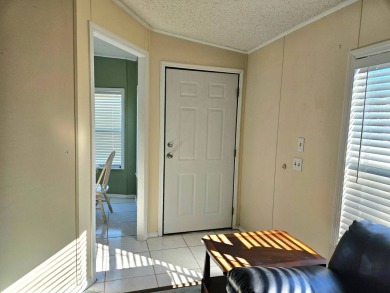 This home is on leased land. Buyers do not own the land. This on Big Cypress Golf and Country Club in Florida - for sale on GolfHomes.com, golf home, golf lot