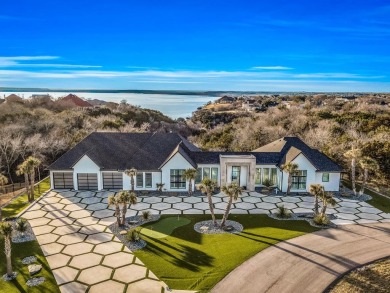 Elegance and luxury at a whole new level. This breathtaking home on White Bluff Resort - Old Course in Texas - for sale on GolfHomes.com, golf home, golf lot