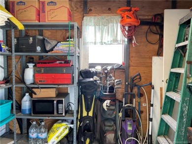 Lovely home with a new A/C in 2021. New washer & dryer and on Indianwood Golf and Country Club in Florida - for sale on GolfHomes.com, golf home, golf lot