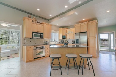 This Exceptional Twin Home sits on a picturesque lot overlooking on Emerald Hills Golf Club in Iowa - for sale on GolfHomes.com, golf home, golf lot