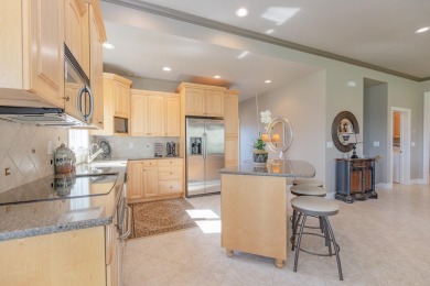 This Exceptional Twin Home sits on a picturesque lot overlooking on Emerald Hills Golf Club in Iowa - for sale on GolfHomes.com, golf home, golf lot