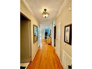 Lovely home with a new A/C in 2021. New washer & dryer and on Indianwood Golf and Country Club in Florida - for sale on GolfHomes.com, golf home, golf lot