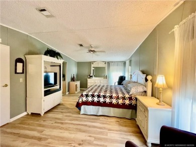 Lovely home with a new A/C in 2021. New washer & dryer and on Indianwood Golf and Country Club in Florida - for sale on GolfHomes.com, golf home, golf lot