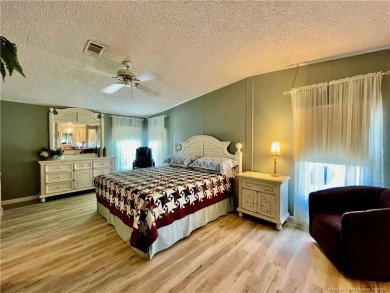 Lovely home with a new A/C in 2021. New washer & dryer and on Indianwood Golf and Country Club in Florida - for sale on GolfHomes.com, golf home, golf lot