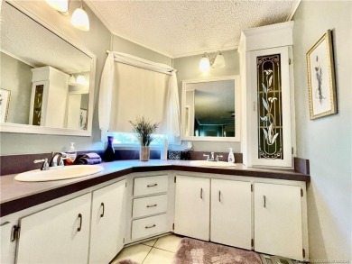 Lovely home with a new A/C in 2021. New washer & dryer and on Indianwood Golf and Country Club in Florida - for sale on GolfHomes.com, golf home, golf lot