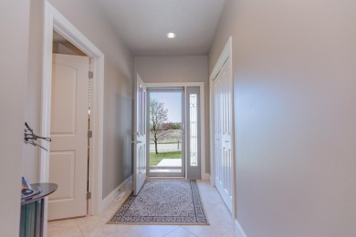 This Exceptional Twin Home sits on a picturesque lot overlooking on Emerald Hills Golf Club in Iowa - for sale on GolfHomes.com, golf home, golf lot